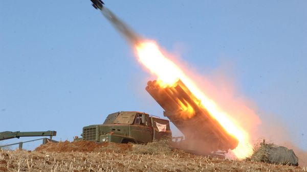 rocket launcher is fired during a live drill by the Jangjae Islet Defense Detachment and the Mu Islet Hero Defense Detachment deployed in the southwestern sector of North Korea - Sputnik International