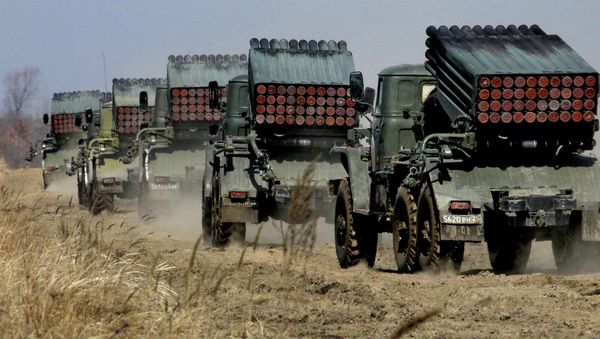 BM-21 launch vehicles during a military exercise of missile and artillery units at the Sergeyevsky training ground in the Primorye Territory. File photo - Sputnik International