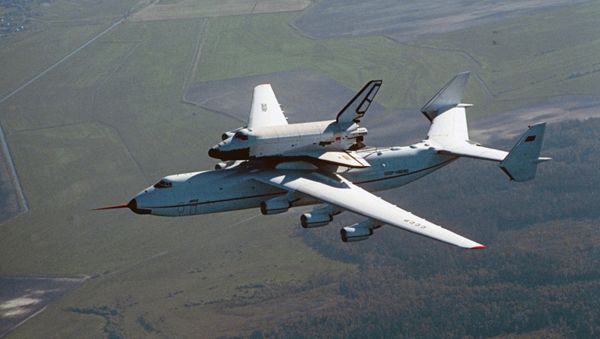 Antonov An-225 aircraft flies with Buran space shuttle on external store - Sputnik International