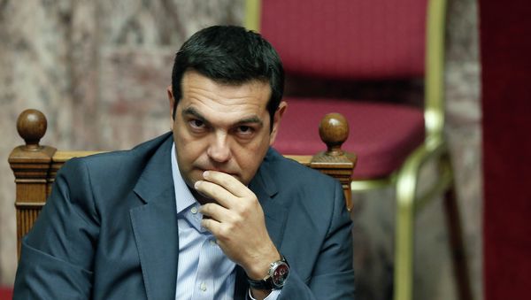 Greek Prime Minister Alexis Tsipras listens during a parliamentary session in Athens, Friday, Aug. 14, 2015 Greek Prime Minister Alexis Tsipras listens during a parliamentary session in Athens, Friday, Aug. 14, 2015 - Sputnik International