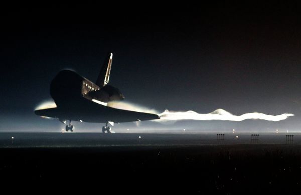 The Space Shuttle Atlantis landing at the Kennedy Space Center at Cape Canaveral, Florida, Thursday, July 21, 2011. The Space Shuttle program was retired upon Atlantis's return. The Space Shuttle Atlantis landing at the Kennedy Space Center at Cape Canaveral, Florida, Thursday, July 21, 2011. The Space Shuttle program was retired upon Atlantis's return. - Sputnik International