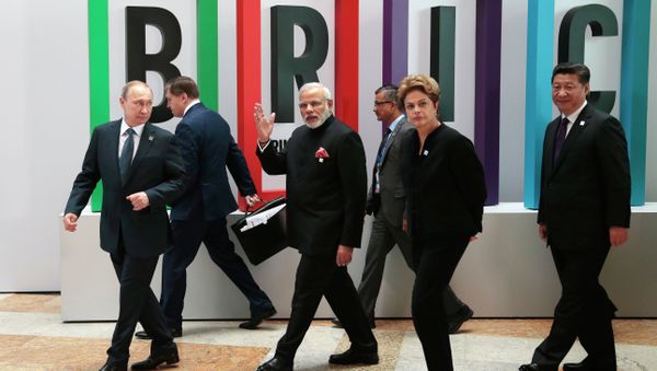 From left in front row: Russian President Vladimir Putin, Indian Prime Minister Narendra Modi, Brazilian President Dilma Rousseff, Chinese President Xi Jinping walk for a plenary session during the summit in Ufa, Russia, Thursday, July 9, 2015 From left in front row: Russian President Vladimir Putin, Indian Prime Minister Narendra Modi, Brazilian President Dilma Rousseff, Chinese President Xi Jinping walk for a plenary session during the summit in Ufa, Russia, Thursday, July 9, 2015 - Sputnik International