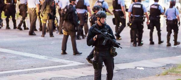 Police line up to block the street as protesters gathered after a shooting incident in St. Louis, Missouri August 19, 2015 Police line up to block the street as protesters gathered after a shooting incident in St. Louis, Missouri August 19, 2015 - Sputnik International
