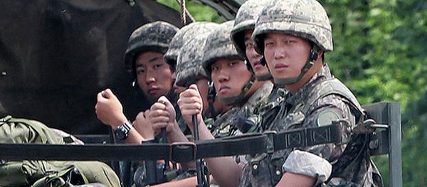 South Korean soldiers ride in the back of a military vehicle in the border county of Yeoncheon on August 22, 2015 - Sputnik International