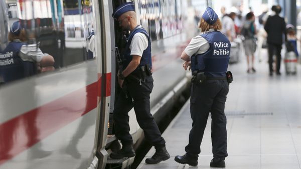Belgian police officers enter a train during a patrol at the Thalys high-speed train terminal at Brussels Midi/Zuid railway station Belgian police officers enter a train during a patrol at the Thalys high-speed train terminal at Brussels Midi/Zuid railway station - Sputnik International