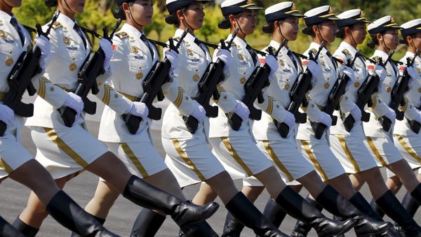 Soldiers of China's People's Liberation Army march with their weapons during a training session for a military parade to mark the 70th anniversary of the end of World War Two, at a military base in Beijing, China, August 22, 2015 - Sputnik International
