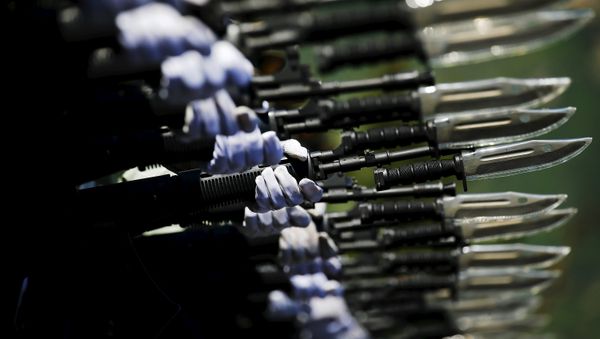 Soldiers of China's People's Liberation Army march with their weapons during a training session for a military parade to mark the 70th anniversary of the end of World War Two, at a military base in Beijing, China, August 22, 2015 - Sputnik International