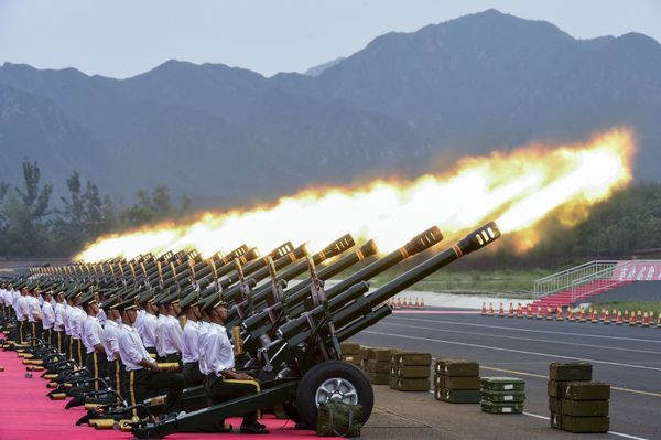 Paramilitary policemen and members of a gun salute team fire cannons during a training session for a military parade to mark the 70th anniversary of the end of the World War Two, at a military base in Beijing, China Paramilitary policemen and members of a gun salute team fire cannons during a training session for a military parade to mark the 70th anniversary of the end of the World War Two, at a military base in Beijing, China - Sputnik International