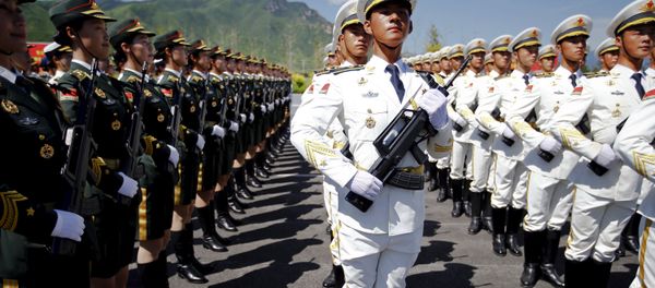 Soldiers of China's People's Liberation Army attend a training session for a military parade to mark the 70th anniversary of the end of World War Two, at a military base in Beijing, China, August 22, 2015 - Sputnik International