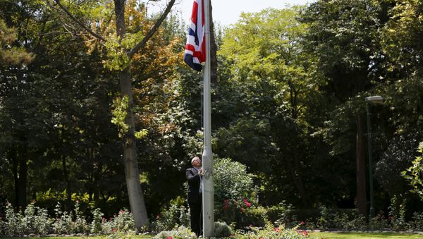 Gary Thompson, overseas security manager at Britain's Foreign and Commonwealth Office, raises the Union flag at British Embassy in Tehran, Iran Gary Thompson, overseas security manager at Britain's Foreign and Commonwealth Office, raises the Union flag at British Embassy in Tehran, Iran - Sputnik International