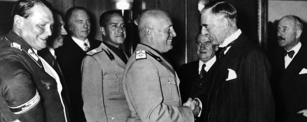 From left to right are: Reichsmarschall and President of the Reichstag Hermann Goering, Italian Foreign Minister Count Ciano and Italian Fascist Leader Benito Mussolini shaking hands with Prime Minister of Great Britain Neville Chamberlain during the Four Power Conference held in autumn 1938 in Munich, Germany. Others not identified - Sputnik International