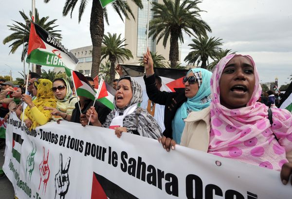Supporters of the Polisario Front separatist movement hold a banner reading All for Palestine, all for Western Sahara during a demonstration at the closing of the World Social Forum (WSF) in Tunis. (File) - Sputnik International