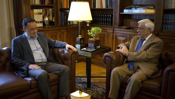 Greek former Energy Minister and leader of the leftist Popular Unity party Panagiotis Lafazanis (L) listens to Greek President Prokopis Pavlopoulos during their meeting in the presidential palace in Athens, Greece, August 24, 2015 - Sputnik International