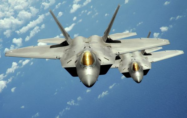 Two US Air Force F-22 Raptor stealth jet fighters fly near Andersen Air Force Base, Guam. File photo Two US Air Force F-22 Raptor stealth jet fighters fly near Andersen Air Force Base, Guam. File photo - Sputnik International