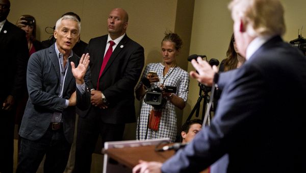 Republican presidential candidate Donald Trump spars with Univision reporter Jorge Ramos before his Make America Great Again Rally at the Grand River Center in Dubuque, Iowa, August 25, 2015 - Sputnik International