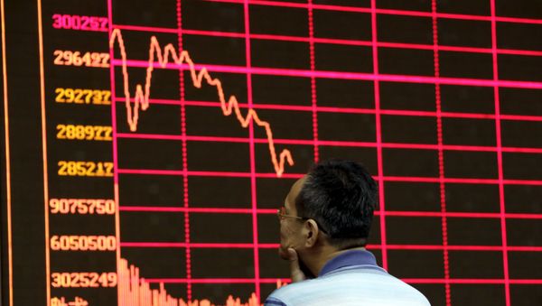An investor looks at an electronic board showing stock information of Shanghai Stock Exchange Composite Index at a brokerage house in Beijing, August 26, 2015 An investor looks at an electronic board showing stock information of Shanghai Stock Exchange Composite Index at a brokerage house in Beijing, August 26, 2015 - Sputnik International