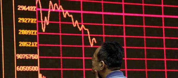 An investor looks at an electronic board showing stock information of Shanghai Stock Exchange Composite Index at a brokerage house in Beijing, August 26, 2015 An investor looks at an electronic board showing stock information of Shanghai Stock Exchange Composite Index at a brokerage house in Beijing, August 26, 2015 - Sputnik International