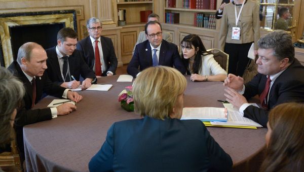 October 17, 2014. Russian President Vladimir Putin (left), Ukrainian President Petro Poroshenko (right), German Chancellor Angela Merkel (near center), and French President Francois Hollande (far center) during a meeting in the Normandy format on the sidelines of the ASEM Summit - Sputnik International