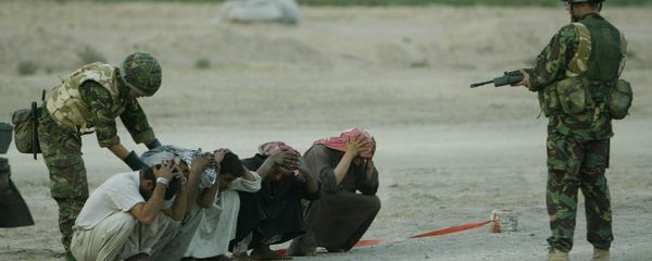 British soldiers with the 1st Armoured Division stops and search Iraqis Monday March 24, 2003, at a checkpoint on the road to Basra. Security around military convoys and encampments has been stepped up after British Army officers warned that their soldiers had come under attack from guerrilla-style paramilitary shootings in southern Iraq British soldiers with the 1st Armoured Division stops and search Iraqis Monday March 24, 2003, at a checkpoint on the road to Basra. Security around military convoys and encampments has been stepped up after British Army officers warned that their soldiers had come under attack from guerrilla-style paramilitary shootings in southern Iraq - Sputnik International