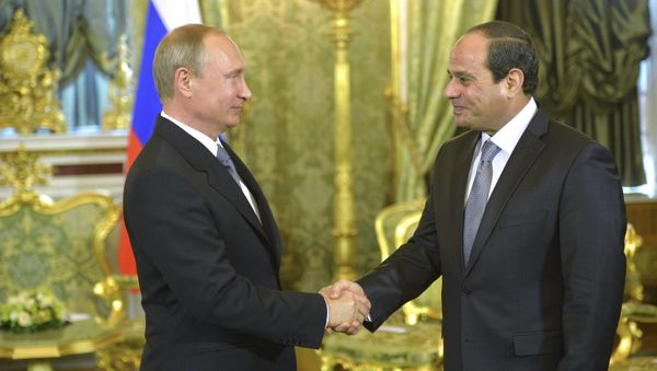 Russian President Vladimir Putin (L) shakes hands with his Egyptian counterpart Abdel Fattah al-Sisi during their meeting in Moscow, August 26, 2015 Russian President Vladimir Putin (L) shakes hands with his Egyptian counterpart Abdel Fattah al-Sisi during their meeting in Moscow, August 26, 2015 - Sputnik International