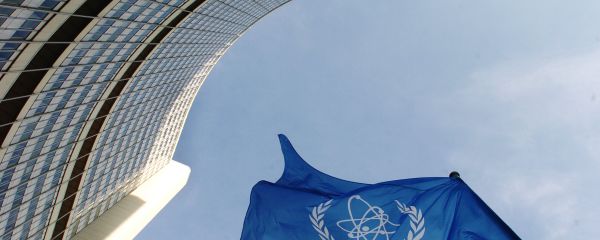 IAEA flag flatters in the wind in front of the International Atomic Energy Agency headquarers in UN city in Vienna - Sputnik International