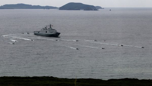Russian-Chinese naval drill Naval Interaction–2015, Vladivostok, August 2015. The exercises constituted the largest joint maritime exercises in the two countries' history. - Sputnik International