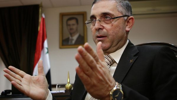 Syrian Minister of State for National Reconciliation Affairs Ali Haidar gives an interview with AFP in Damascus on November 10, 2014. Syrian Minister of State for National Reconciliation Affairs Ali Haidar gives an interview with AFP in Damascus on November 10, 2014. - Sputnik International