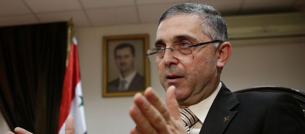Syrian Minister of State for National Reconciliation Affairs Ali Haidar gives an interview with AFP in Damascus on November 10, 2014. Syrian Minister of State for National Reconciliation Affairs Ali Haidar gives an interview with AFP in Damascus on November 10, 2014. - Sputnik International