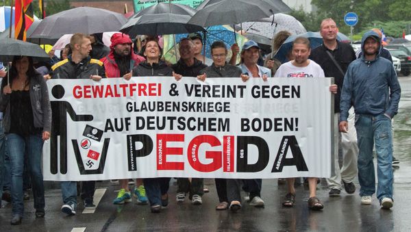 Participants of a rally called 'Patriotic Europeans against the Islamization of the West' (PEGIDA) demonstrate in Chemnitz, eastern Germany, Monday, Aug. 17, 2015 Participants of a rally called 'Patriotic Europeans against the Islamization of the West' (PEGIDA) demonstrate in Chemnitz, eastern Germany, Monday, Aug. 17, 2015 - Sputnik International