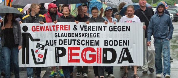 Participants of a rally called 'Patriotic Europeans against the Islamization of the West' (PEGIDA) demonstrate in Chemnitz, eastern Germany, Monday, Aug. 17, 2015 Participants of a rally called 'Patriotic Europeans against the Islamization of the West' (PEGIDA) demonstrate in Chemnitz, eastern Germany, Monday, Aug. 17, 2015 - Sputnik International