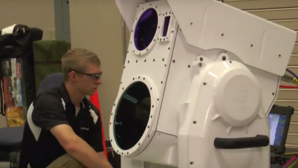 Boeing has developed a working laser cannon specifically designed to take down wayward UAVs. Boeing has developed a working laser cannon specifically designed to take down wayward UAVs. - Sputnik International