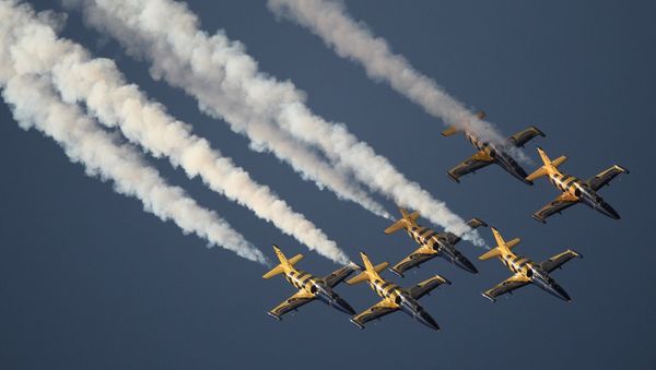 Aero L-39 Albatros jet trainers of the Rus aerobatic display team perform during the International Aerospace Salon (MAKS 2015) in Zhukovsky near Moscow - Sputnik International