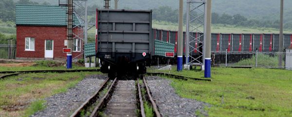 The first freight train crosses the new railway checkpoint between the Russian station Makhalino and Chinese station Hunchun, Jilin province The first freight train crosses the new railway checkpoint between the Russian station Makhalino and Chinese station Hunchun, Jilin province - Sputnik International