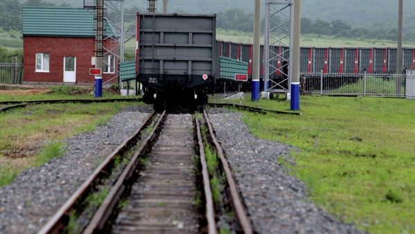 The first freight train crosses the new railway checkpoint between the Russian station Makhalino and Chinese station Hunchun, Jilin province The first freight train crosses the new railway checkpoint between the Russian station Makhalino and Chinese station Hunchun, Jilin province - Sputnik International