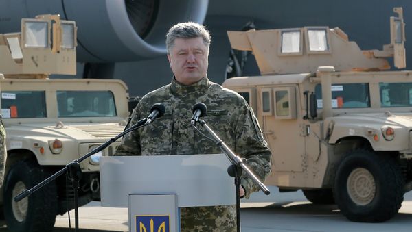 Ukraine's President Petro Poroshenko speaks during ceremony at U.S. armored Humvees in Boryspil Airport, Kiev, Ukraine, Wednesday, March 25, 2015 Ukraine's President Petro Poroshenko speaks during ceremony at U.S. armored Humvees in Boryspil Airport, Kiev, Ukraine, Wednesday, March 25, 2015 - Sputnik International