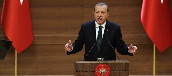In this file picture take on August 12, 2015 Turkish President Recep Tayyip Erdogan addresses a meeting at the presidential palace in Ankara - Sputnik International