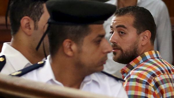 Al Jazeera television journalist Baher Mohamed walks to the dock before hearing the verdict at a court in Cairo, Egypt, August 29, 2015 Al Jazeera television journalist Baher Mohamed walks to the dock before hearing the verdict at a court in Cairo, Egypt, August 29, 2015 - Sputnik International