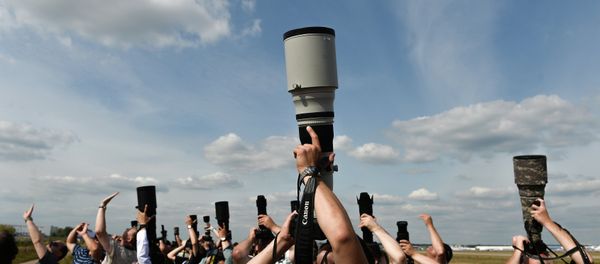 Photo correspondents at the MAKS 2015 International Aviation and Space Salon in Zhukovsky outside Moscow. - Sputnik International