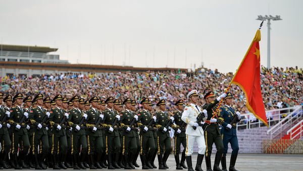 Soldiers of China's People's Liberation Army (PLA) march during a rehearsal for a military parade in Beijing - Sputnik International