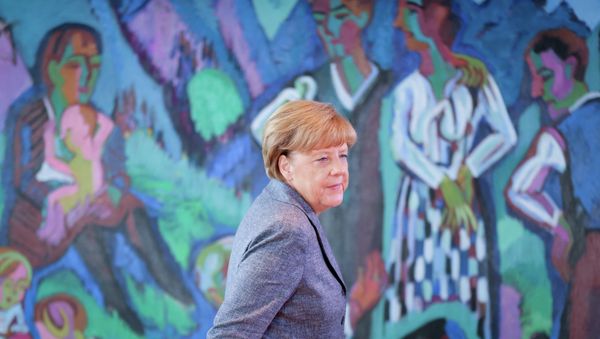 German chancellor Angela Merkel arrives for a cabinet meeting at the chancellery in Berlin, Aug. 26, 2015. - Sputnik International