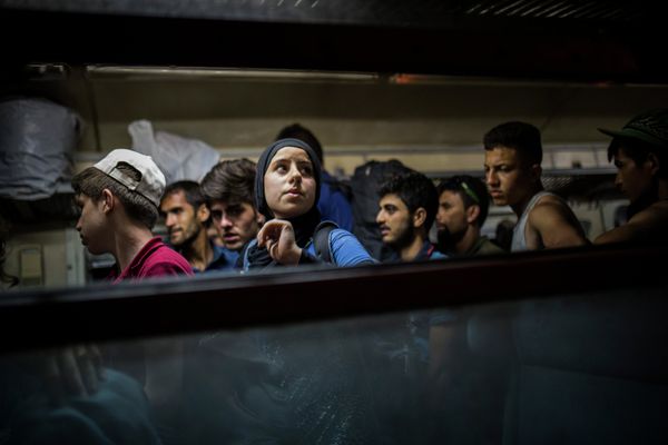 Refugees get off a train at the Macedonian station of Tabanovce, a few hundred meters away from the border with Serbia, on Friday Aug. 28, 2015. Refugees get off a train at the Macedonian station of Tabanovce, a few hundred meters away from the border with Serbia, on Friday Aug. 28, 2015. - Sputnik International
