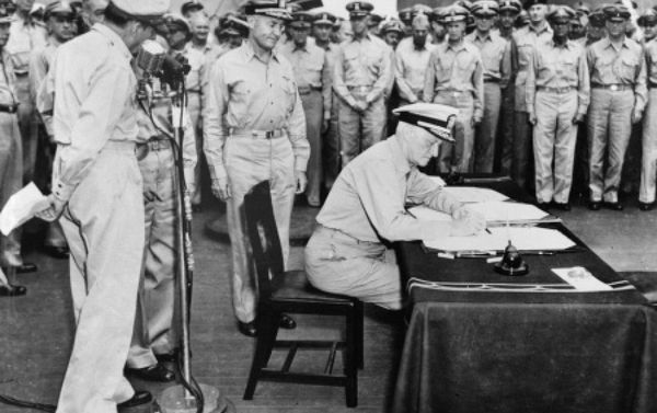 Admiral Chester Nimitz, representing the United States, signs the instrument of surrender. Admiral Chester Nimitz, representing the United States, signs the instrument of surrender. - Sputnik International