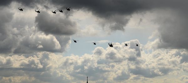 Mi 28 helicopters, military transport helicopter Mi 26, third from right, and MI 8 helicopters during a full dress rehearsal of the V-Day Parade on Red Square, Moscow. Mi 28 helicopters, military transport helicopter Mi 26, third from right, and MI 8 helicopters during a full dress rehearsal of the V-Day Parade on Red Square, Moscow. - Sputnik International