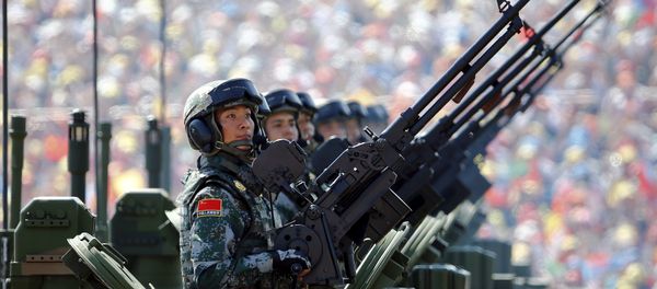Soldiers of the People's Liberation Army (PLA) of China arrive on their armoured vehicles at Tiananmen Square during the military parade marking the 70th anniversary of the end of World War Two, in Beijing, China, September 3, 2015 Soldiers of the People's Liberation Army (PLA) of China arrive on their armoured vehicles at Tiananmen Square during the military parade marking the 70th anniversary of the end of World War Two, in Beijing, China, September 3, 2015 - Sputnik International