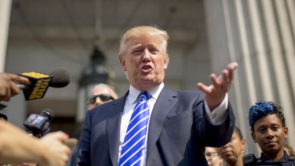 US Republican presidential candidate Donald Trump exits the Manhattan Supreme Courthouse following service of jury duty in New York August 17, 2015 - Sputnik International