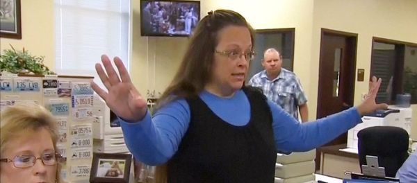 Rowan County Clerk Kim Davis gestures as she refuses to issue marriage licenses to a same-sex couple in Morehead, Kentucky September 1, 2015, in a still image from video provided by WLEX - Sputnik International