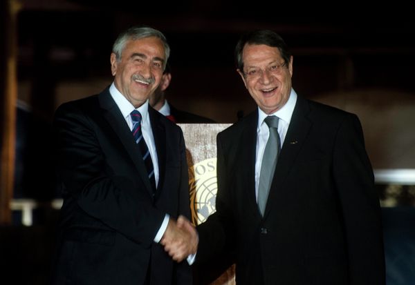 Cypriot President Nicos Anastasiades (R) shakes the hand of Turkish Cypriot President of the self-proclaimed Turkish Republic of Northern Cyprus (TRNC), Mustafa Akinci, following a UN-sponsored meeting at Ledra palace on May 11, 2015 Cypriot President Nicos Anastasiades (R) shakes the hand of Turkish Cypriot President of the self-proclaimed Turkish Republic of Northern Cyprus (TRNC), Mustafa Akinci, following a UN-sponsored meeting at Ledra palace on May 11, 2015 - Sputnik International
