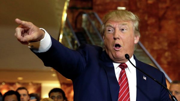 Republican presidential candidate Donald Trump calls on a questioner during a news conference at Trump Tower, in New York, Thursday, Sept. 3, 2015 - Sputnik International