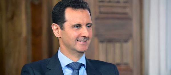 Syria's President Bashar al-Assad answers questions during an interview with al-Manar's journalist Amro Nassef, in Damascus, Syria, in this handout photograph released by Syria's national news agency SANA on August 25, 2015 Syria's President Bashar al-Assad answers questions during an interview with al-Manar's journalist Amro Nassef, in Damascus, Syria, in this handout photograph released by Syria's national news agency SANA on August 25, 2015 - Sputnik International