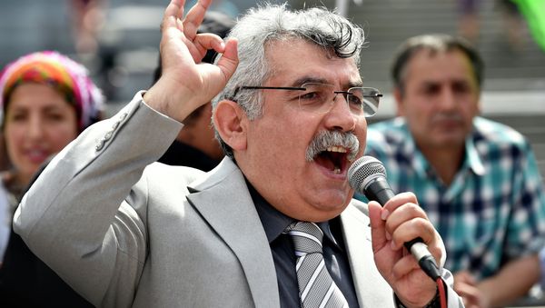 Zubeyir Aydar, president of the People's Congress of Kurdistan, addresses Kurdish protesters during a demonstration against alleged attacks perpetrated by the Turkish army against Kurds, in Brussels on August 8, 2015 Zubeyir Aydar, president of the People's Congress of Kurdistan, addresses Kurdish protesters during a demonstration against alleged attacks perpetrated by the Turkish army against Kurds, in Brussels on August 8, 2015 - Sputnik International